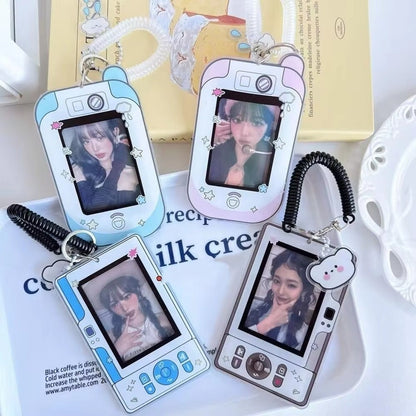 DIGITAL CAMERA PHOTOCARD HOLDER