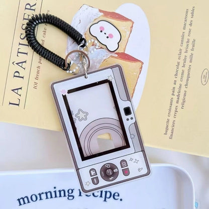 DIGITAL CAMERA PHOTOCARD HOLDER
